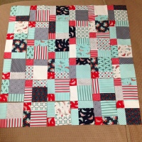 Daysail disappearing 9 patch baby quilt